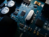 focus photo of gray and black circuit board