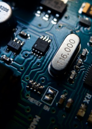 focus photo of gray and black circuit board