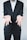 A person in a dark suit is standing with their arms extended forward, palms facing up in a gesture of openness or offering. The background is plain and light-colored, creating a sharp contrast with the dark suit.