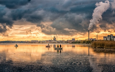 panoramic photo of people riding on boats