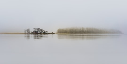 photo of Helsinki River near Three Smiths Statue