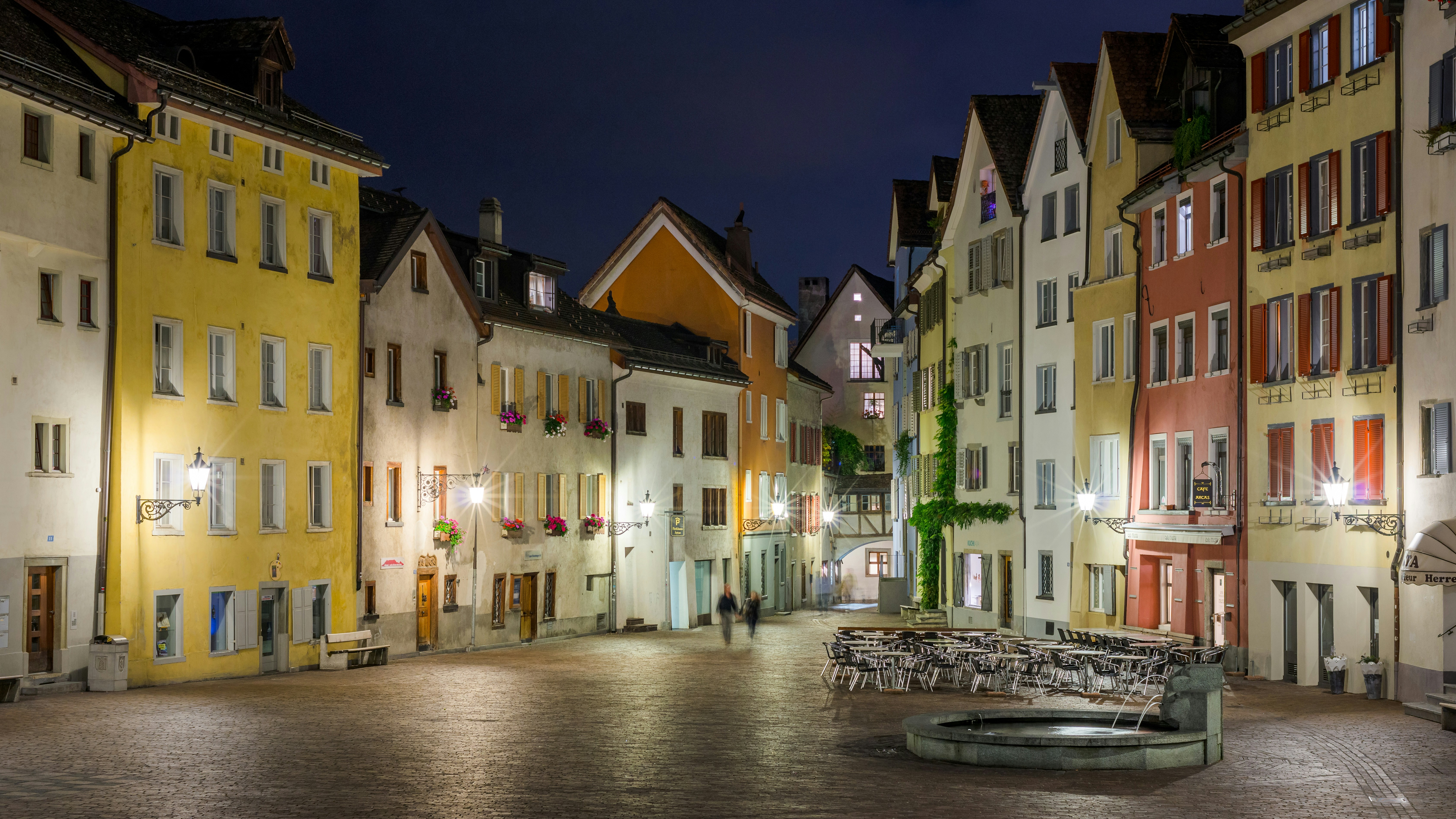 two person walking on street with lights, night walk