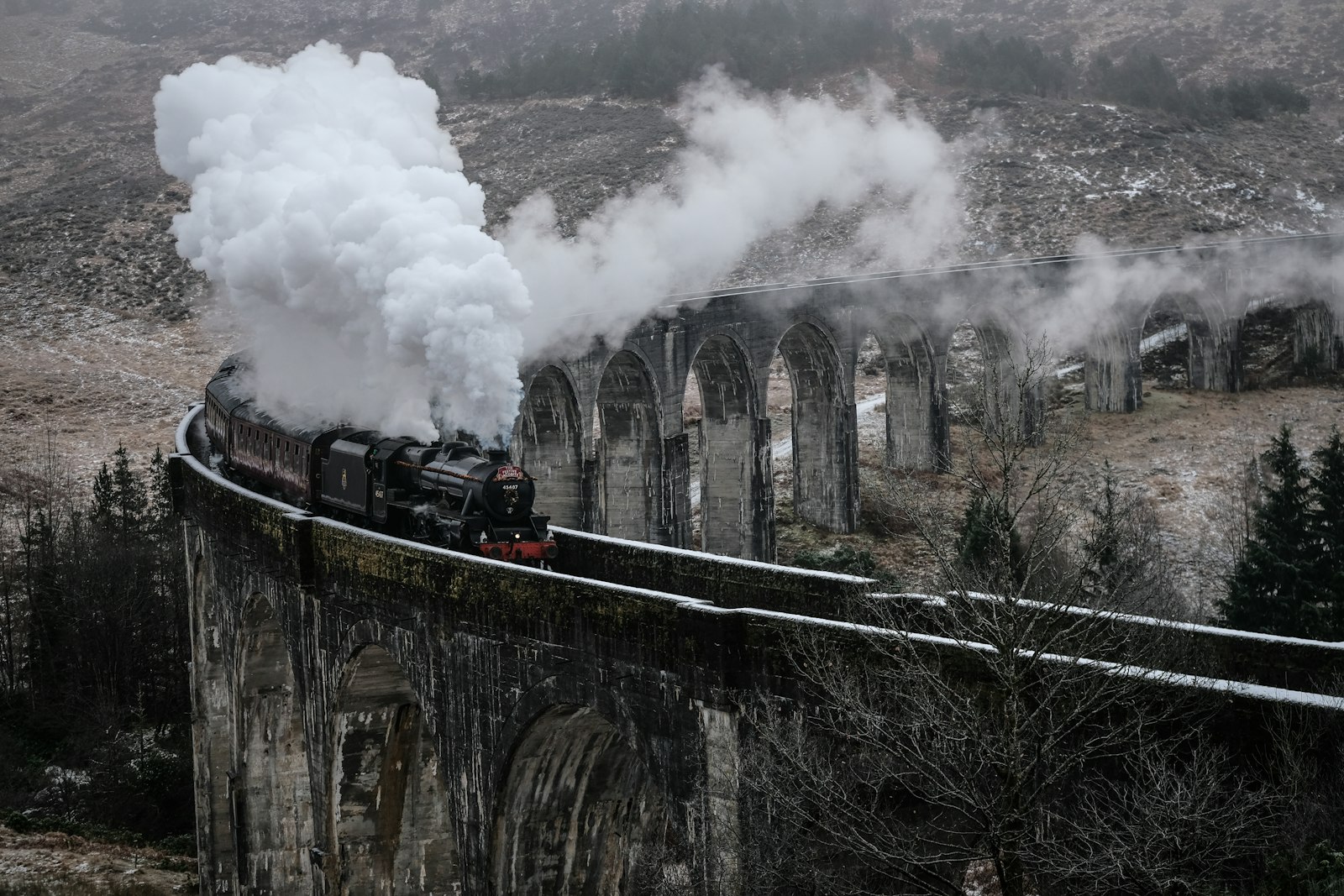 Fujifilm XF 50-140mm F2.8 R LM OIS WR sample photo. Black steam train emitting photography