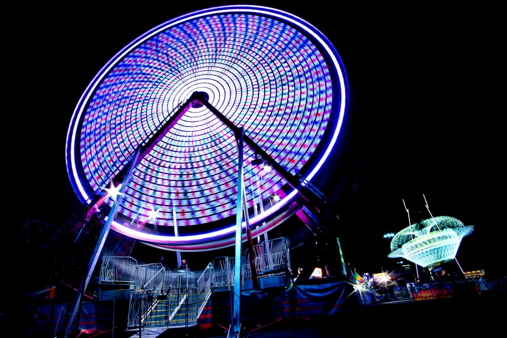 purple lighted Ferris wheel
