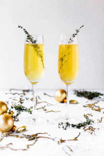 Luxurious wedding toast with sparkling glasses and golden accents.