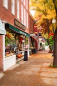 Historic downtown Sevierville street lined with quaint shops and autumn leaves