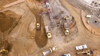 aerial photography of dump trucks