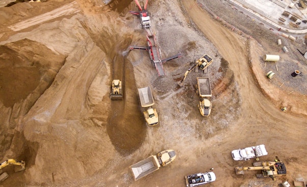 aerial photography of dump trucks