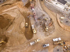 aerial photography of dump trucks