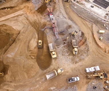 aerial photography of dump trucks
