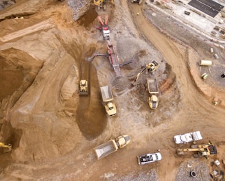 aerial photography of dump trucks