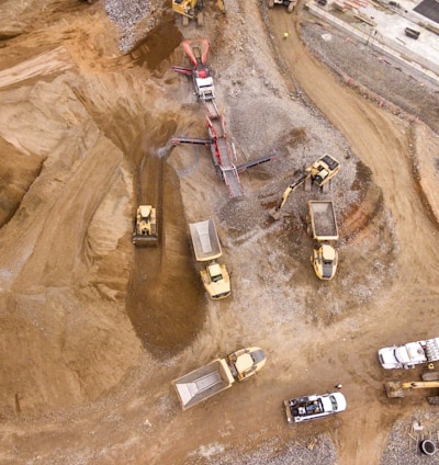 aerial photography of dump trucks