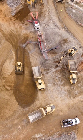 aerial photography of dump trucks