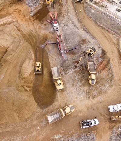 aerial photography of dump trucks