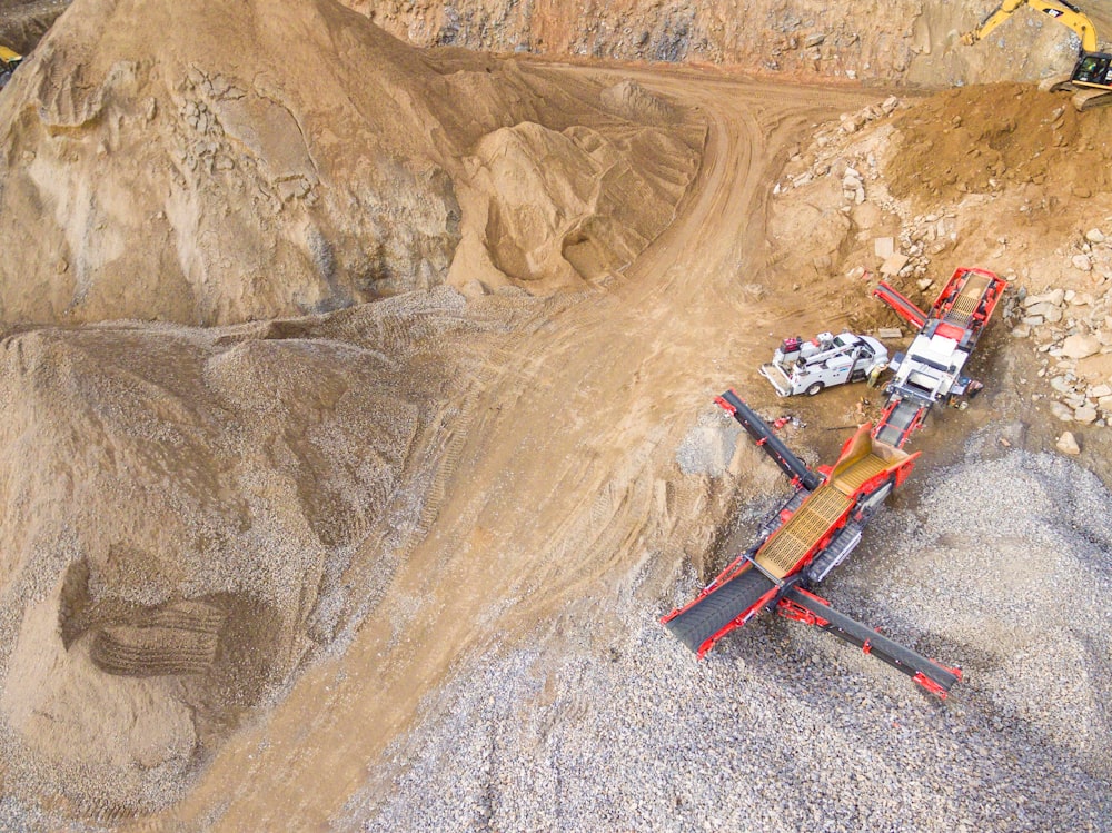 aerial photo of heavy equipment on mining site