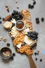 baked breads and cookies on brown wooden board