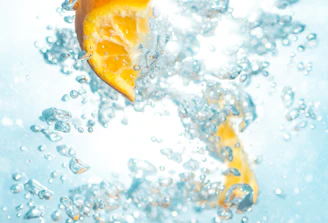 sliced orange fruits underwater