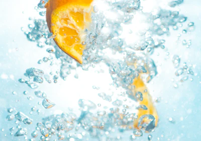 sliced orange fruits underwater