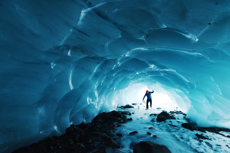 Alaska Travels - Walking inside a glacier cave with blue frozen water