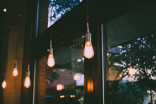 modern retro lights illuminating store front