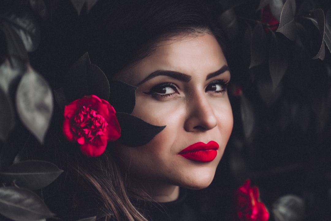 woman in red lipsticks