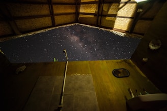 A clean and modern portable shower toilet setup in a scenic outdoor location.