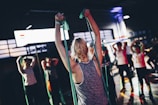 group of people in gym while exercising