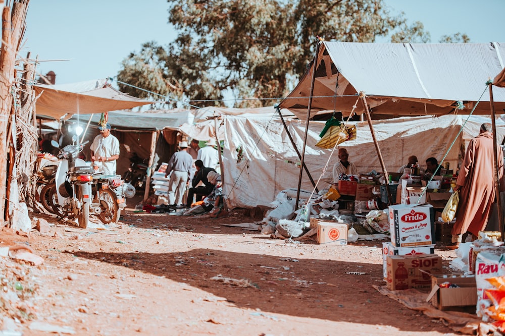 group of people near tent during daytime