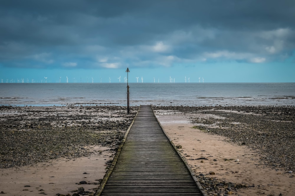 brown docks with body of water background