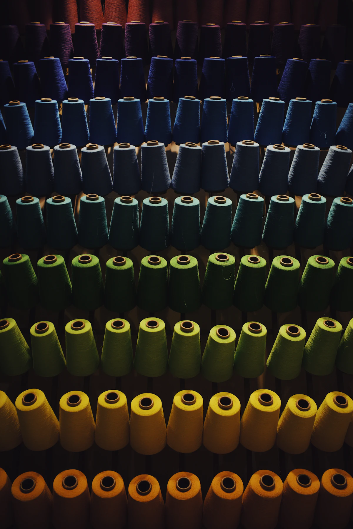 Assorted coloured thread spools