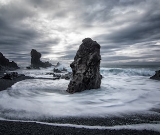 stony beach during cloudy day