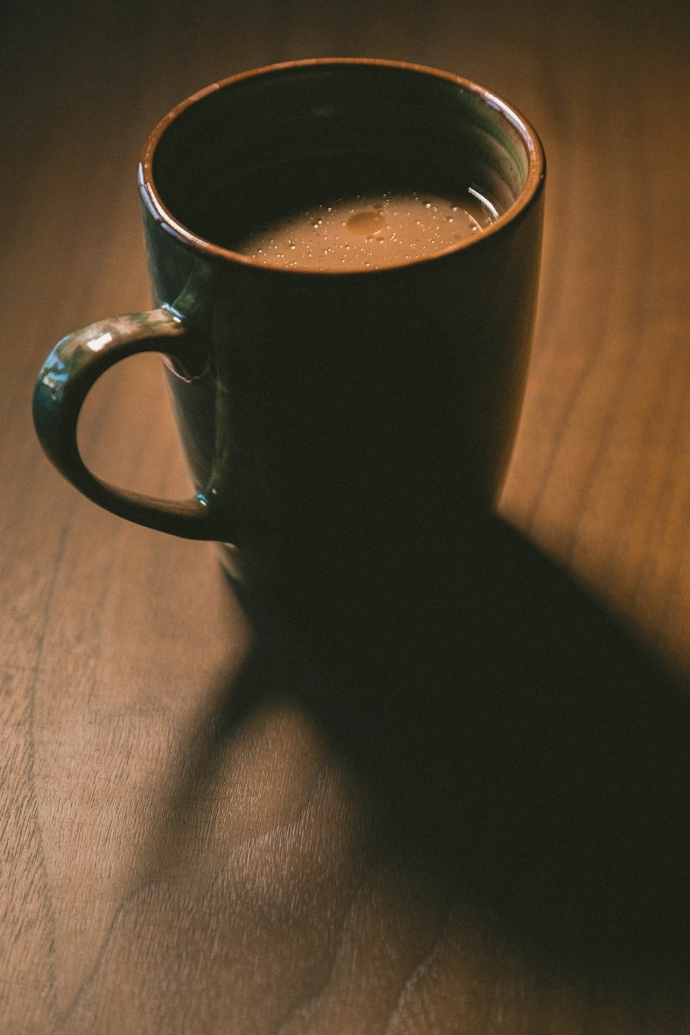 coffee in green ceramic mug