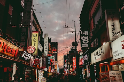 Vibrant Seoul nightlife district with glowing signs