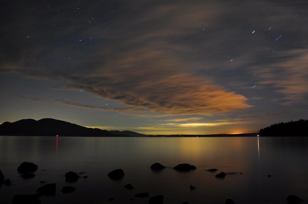 body of water during nighttime