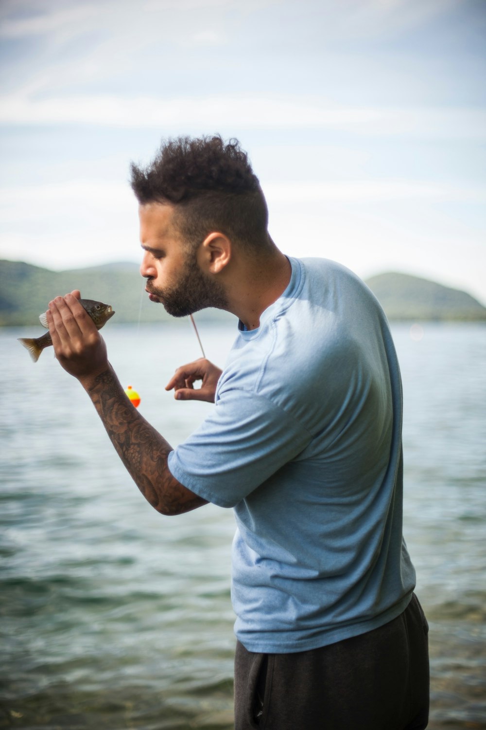 man staring at the fish