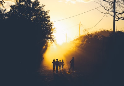 silhouette of children madagascar teams background