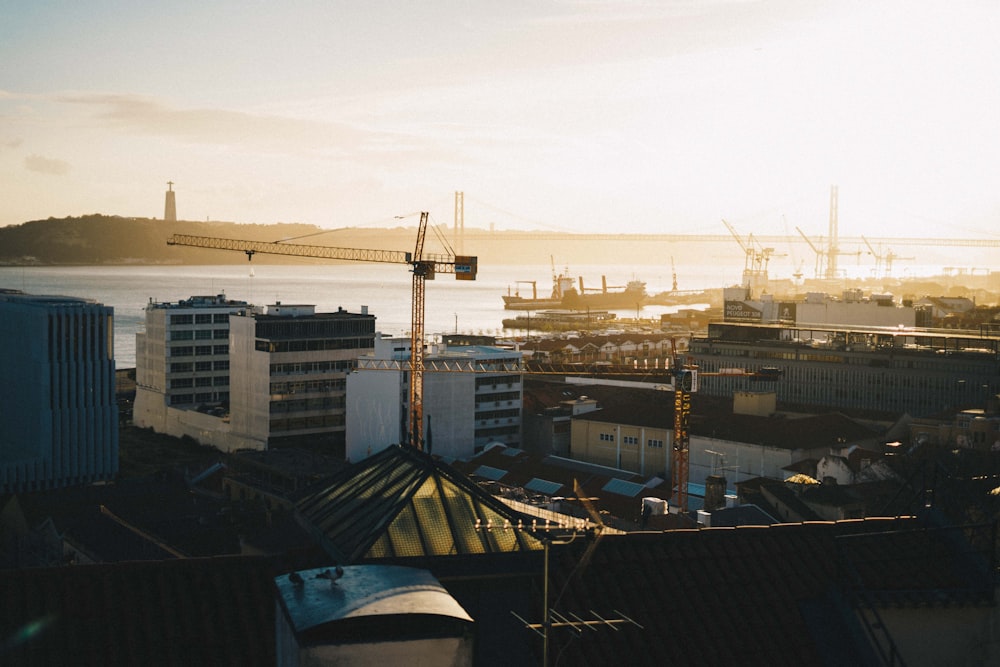 brown tower crane at sunset