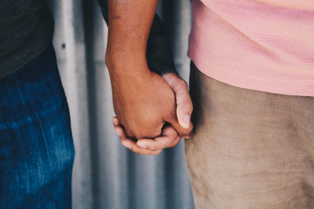 focus photo of couple's hands