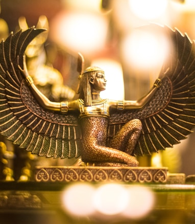 Goddess Isis figurine wallpaper