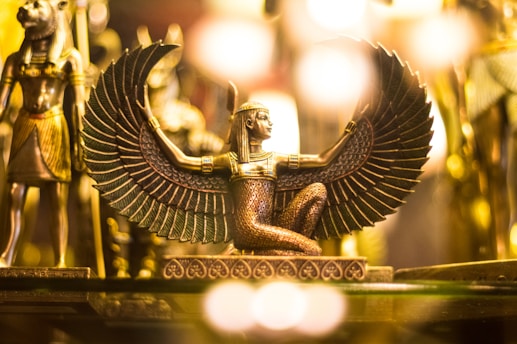 Goddess Isis figurine wallpaper