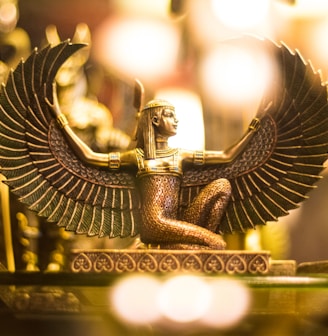 Goddess Isis figurine wallpaper