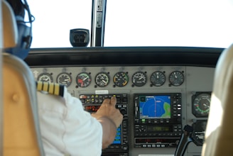 pilot controlling airplane dashboard