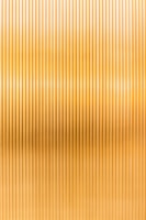 a gold metallic background with vertical lines