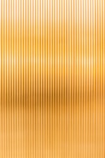a gold metallic background with vertical lines