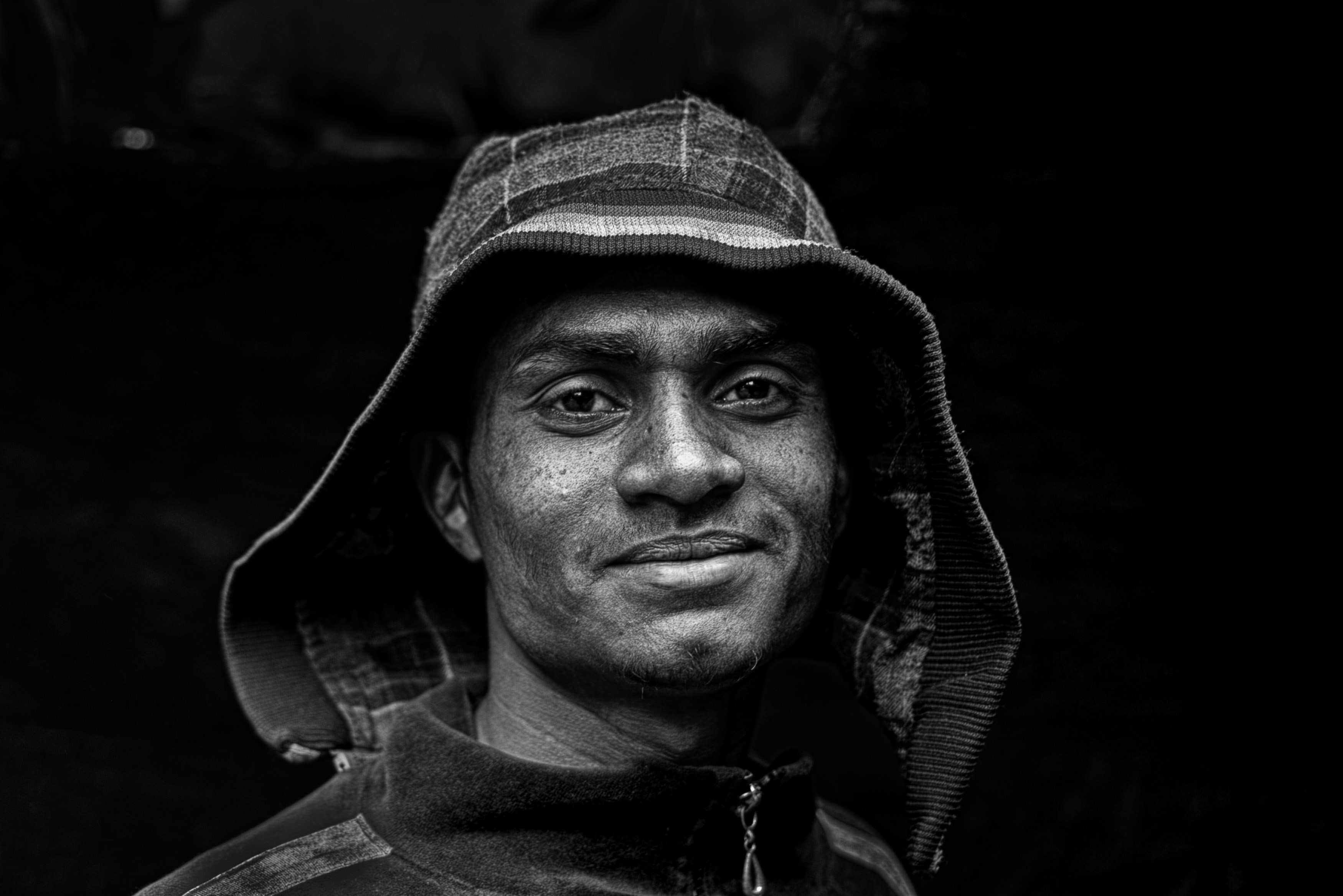 great photo recipe,how to photograph a shipyard worker with a hoodie in dhaka, bangladesh.; man wearing hoodie