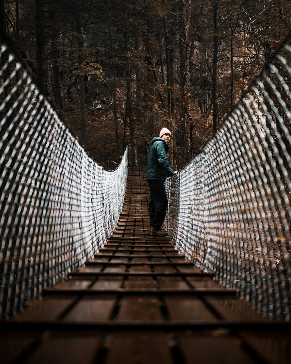 woman standing at bridge