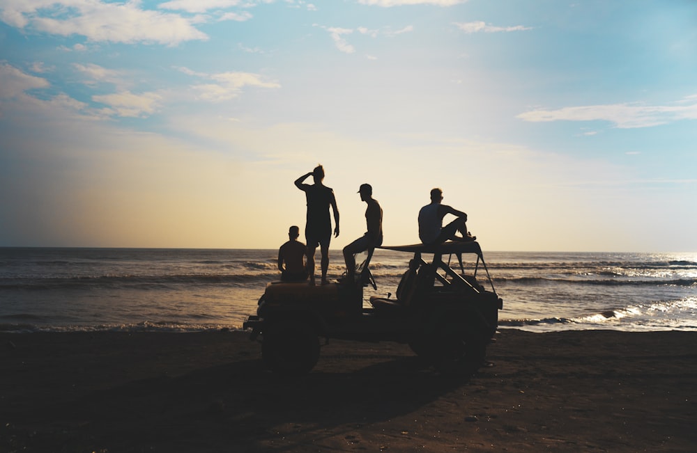 group of people riding SUV during daytime