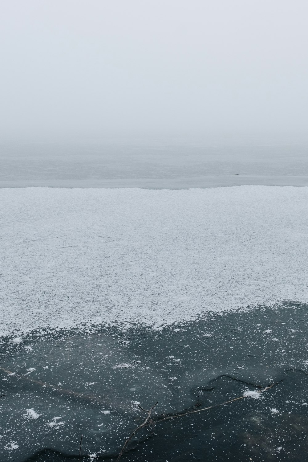 body of water with snow