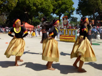 Traditional dancers performing in bright costumes during a local festival in Burundi