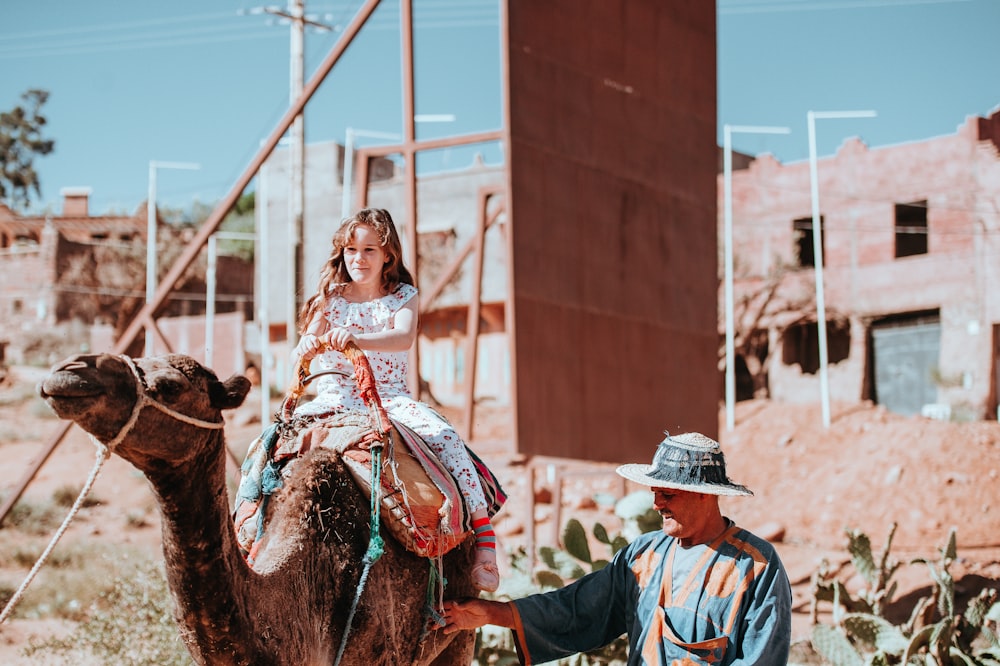 girl riding camel